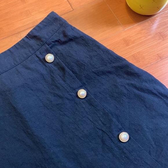 Black mini skirt with faux button detail - Picture 2 of 2